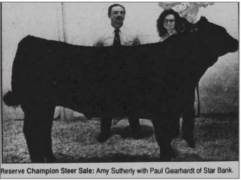 May be an image of text that says 'Reserve Champion Steer Sale: Amy Sutherly with Paul Gearhardt of Star Bank.'