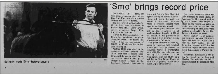 May be an image of text that says ''Smo' brings record price COLUMBUS UPI Smo, shirts and Culter's Fine Meats bid The champion erand 新間 Hara, for Burger pric for brosghe Sutherly Suthertylads'Smo'beforebuyers leads 'Smo' before buyers trought-sticken ber Ledford, Celebrity Hats 0O Parker aity, Super Duper passed Columbus attended million mark 45.712 Mos-'
